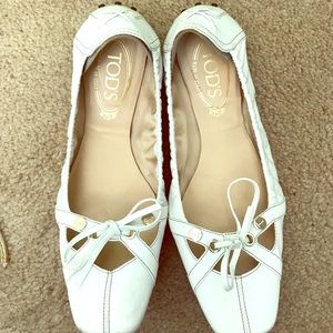 Tod’s white flats.
